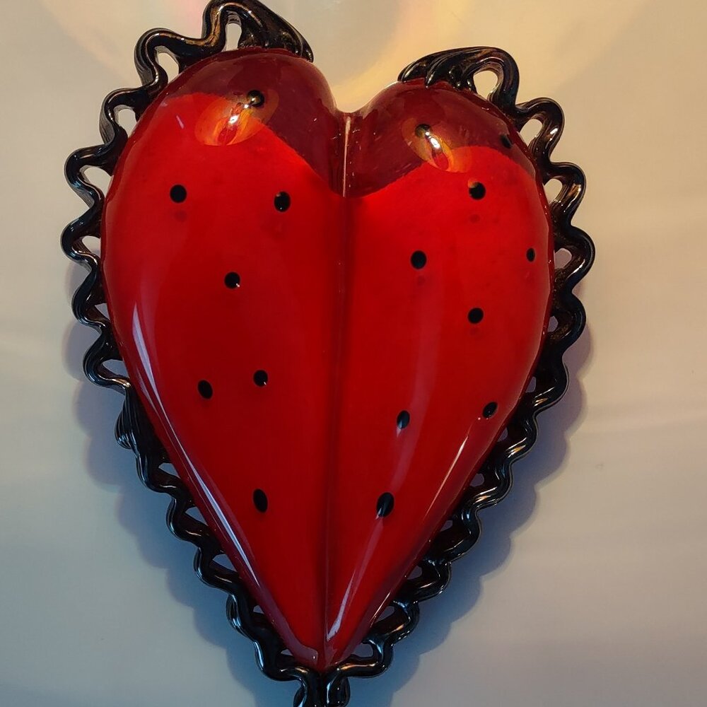 Famous artist Paulus Tjiang glass heart sculpture